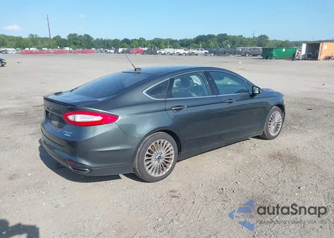 2015 Ford Fusion Titanium z USA, uszkodzony, nr VIN 3FA6P0K9XFR116015